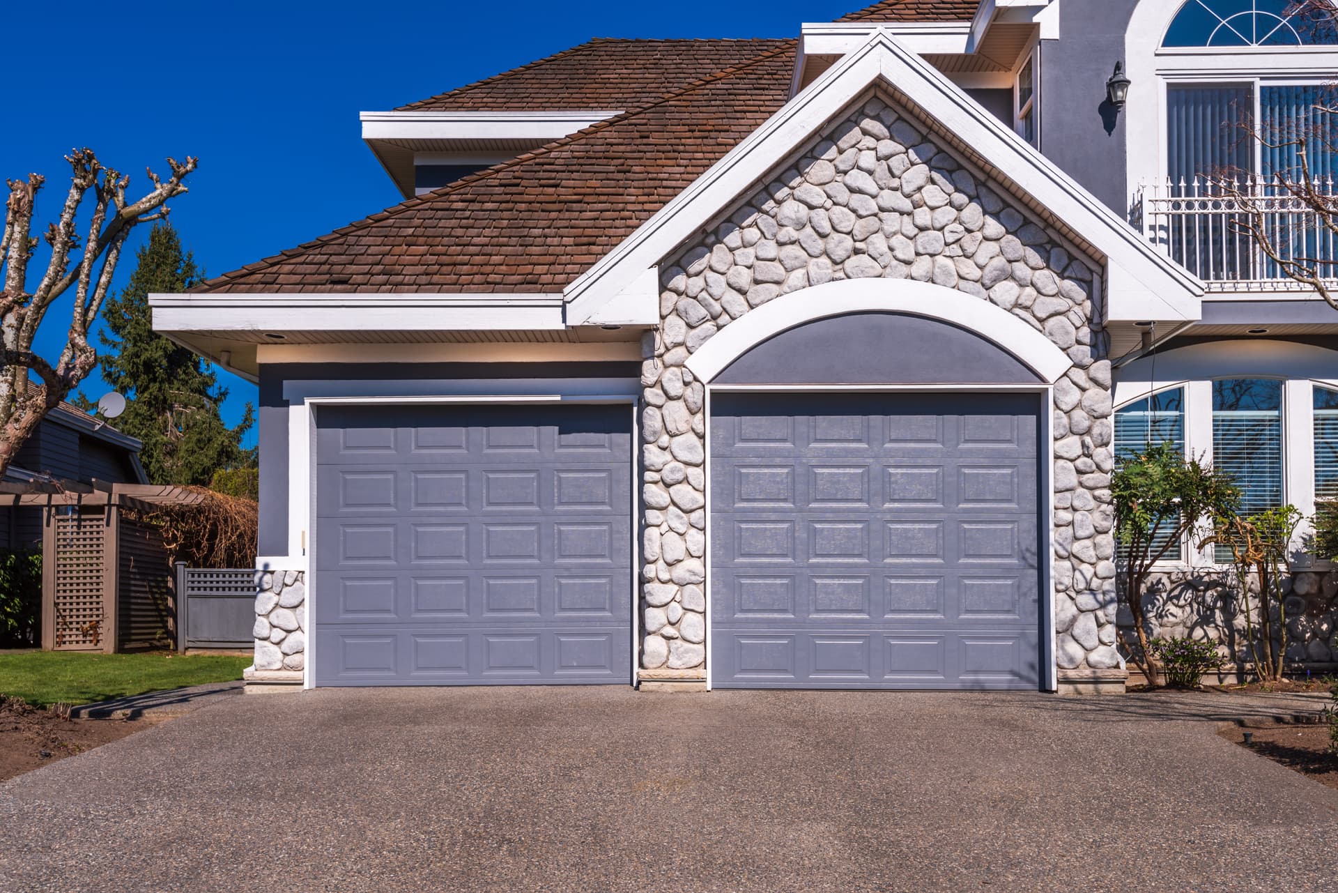 Steel garage door installation for a southern New Hampshire home